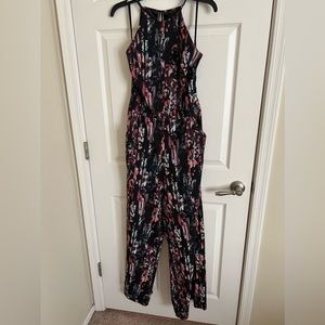 Beautiful floral jumpsuit Bebe size 8